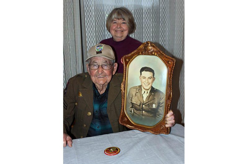 James Richardson, 99, a member of the famed Merrill's Marauders in Burma during World War II, poses with his daughter, Judy Robinson, in February 2020.