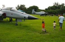 Filipino families enjoy relics culled from the Philippine Air Force in a park near Clark International Airport.