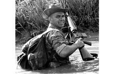 Master Sgt. Wayne Whightsil on patrol in South Vietnam, 1964.