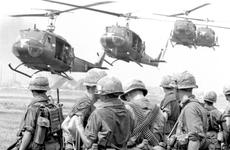 South Vietnam, April, 1967: Helicopters stream in to take soldiers from the 27th Infantry, 25th Infantry Division on an "Eagle Mission" to investigate suspicious activity and round up Viet Cong suspects in Hau Nghia province.