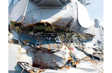 The stateroom of the USS Fitzgerald's stateroom as seen from the exterior of the ship after its collision on June 21, 2017.