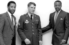 Cardinals players Ozzie Smith, left, and Vince Coleman, right, pose for a photo with Sgt. David Morse of Camp Zama in January, 1988.