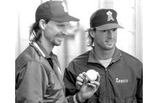 Randy Johnson and Chuck Finley pose for photos after the no-hitter against the Japan All-Stars.