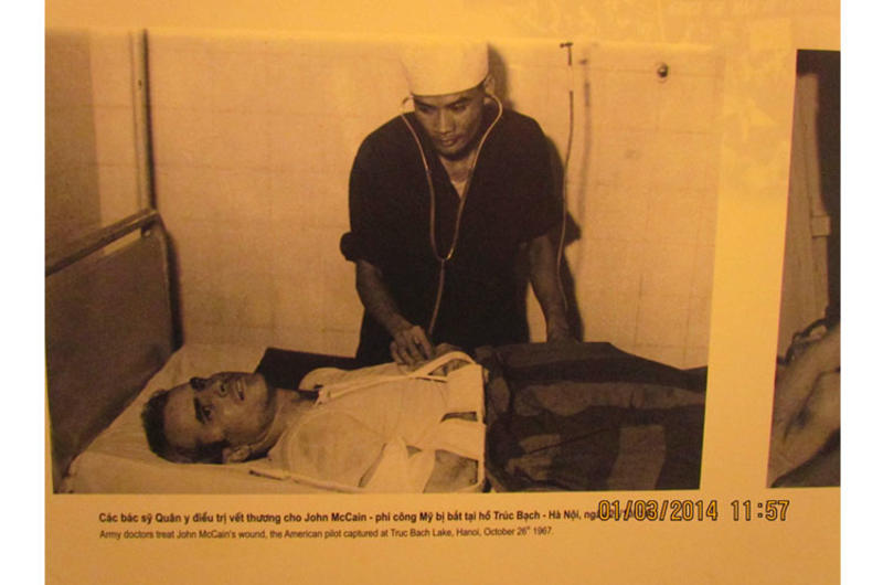 A Vietnamese doctor is shown treating John McCain at the ''Hanoi Hilton'' prison after his jet was shot down during the Vietnam War. McCain later became a U.S. senator and unsuccessful candidate for president.