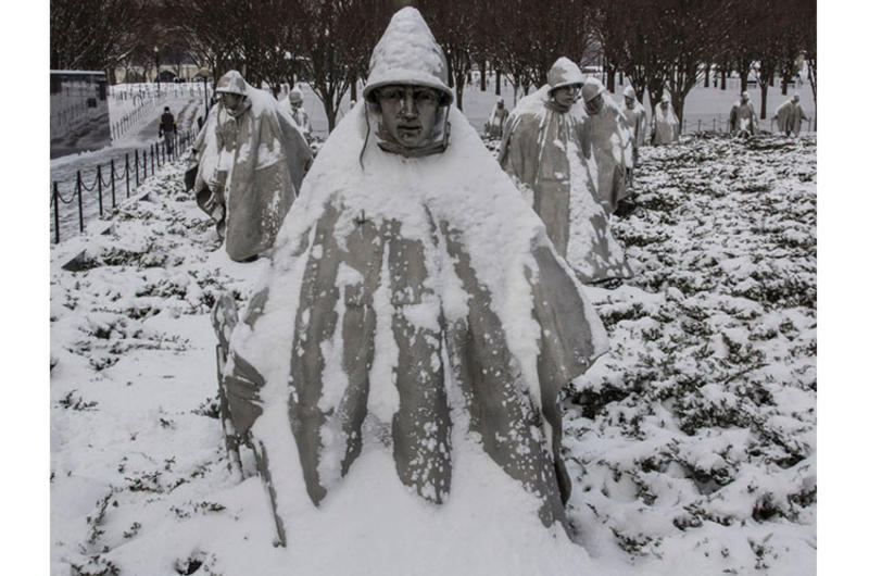 Snow covering the statues at the Korean War Veterans Memorial in Washington, D.C., during a February, 2015 storm serves as a reminder of the hardships endured by troops who fought in the conflict.