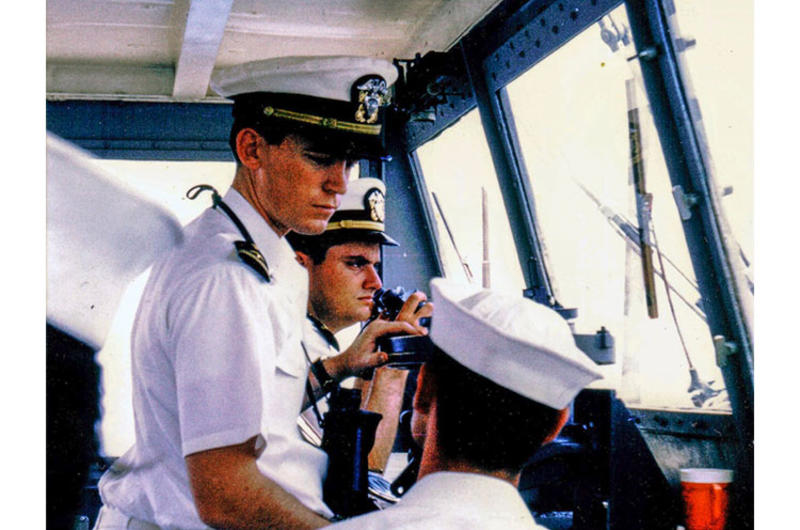Ensign Bill Gross on the bridge of the USS Diachenko in August 1968 as the ship returns from its deployment to Vietnam and arrives in San Diego, Calif. Behind Gross is Ensign Dennis Devitt.