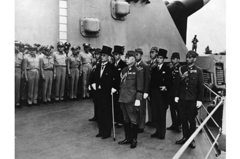 Japanese representatives arrive aboard the USS Missouri in Tokyo Bay to participate in formal surrender ceremonies on Sept. 2, 1945.