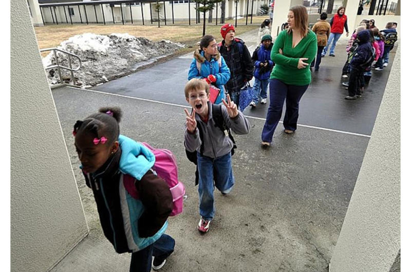 Staff and students return to Sollars Elementary School on Monday at Misawa Air Base, Japan.