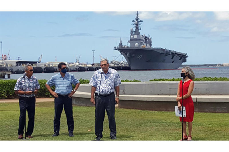 Members of the 75th World War II Commemoration Committee talk with reporters at the Pearl Harbor Visitors Center, Hawaii, Wednesday, Aug. 5, 2020.
