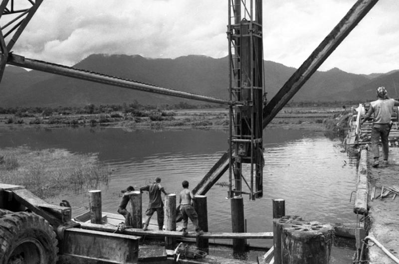 Seabees build a bridge on Route 1 between Phu Loc and Lang Co, South Vietnam, in 1967.