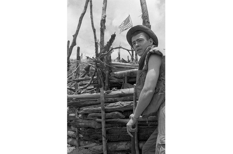 Pfc. Mike Colwell, 20, E Company, 3rd Battalion, 187th Infantry Regiment, 101st Airborne Division leans against his bunker on top of Hill 937 of Dong Ap Bia, better known to Americans as Hamburger Hill.