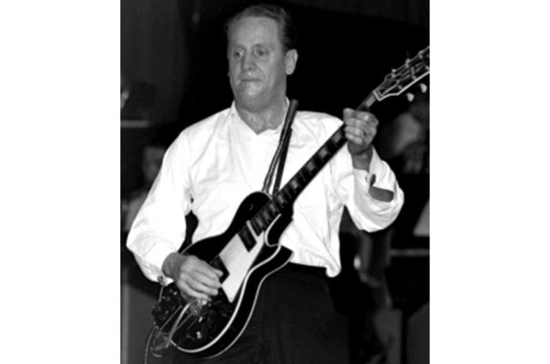 Guitar legend Les Paul performs at the Grant Heights NCO Club during a tour of military clubs in Japan, the Philippines and Okinawa.
