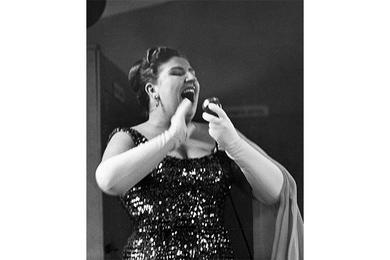 Repeat Performance - Alliene Flannary captures the audience with her Sophie Tucker style of singing during the "Laugh With the Girls" show at Ascom, Korea.
